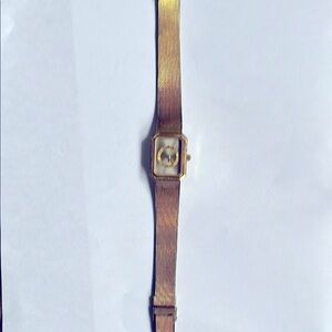 Bulova Gold tone Rectangular ladies Watch 1980’s. Not running-band damage